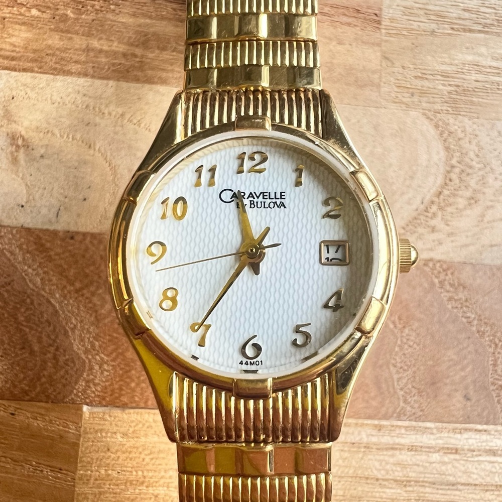 Caravelle by Bulova ladies gold tone expansion band dress watch NEW BATTERY